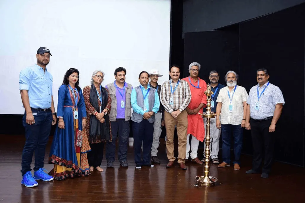 Guests lighting the ceremonial inauguration lamp at the seminar